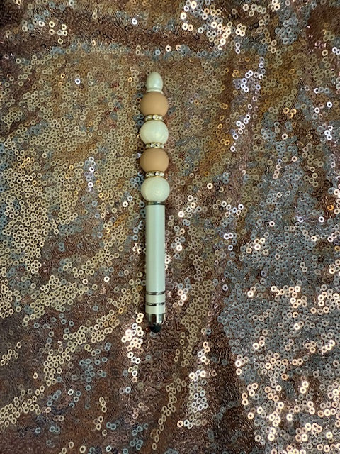 Tan and white stylus