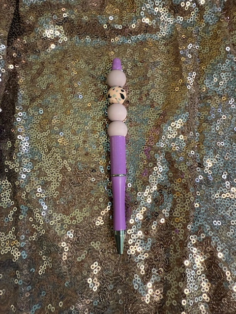 Purple and spotted pink pen