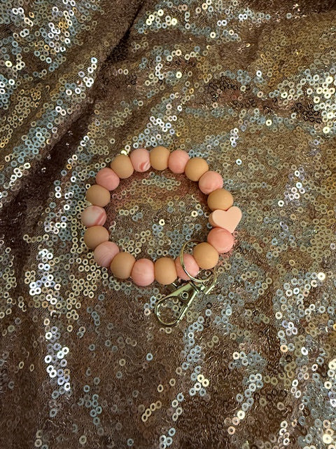 tan heart wristlet
