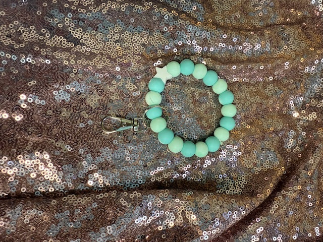 Teal green star wristlet