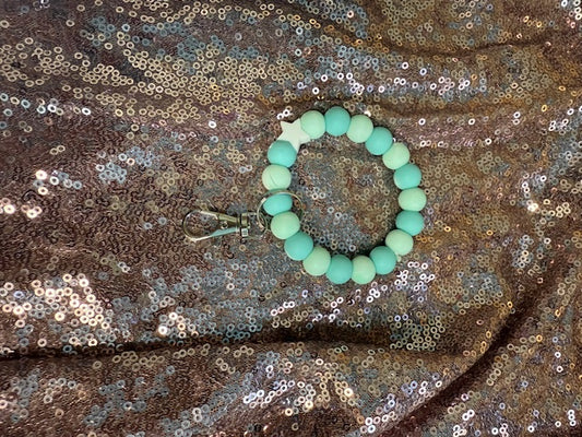 Teal green star wristlet